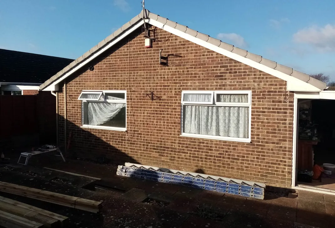 Bungalow cladding before project