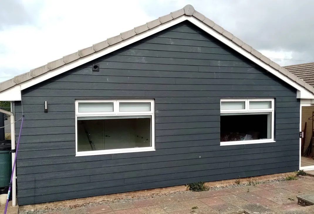 Bungalow after anthracite cladding
