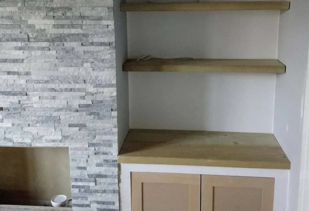 False wall storage unit and shelves