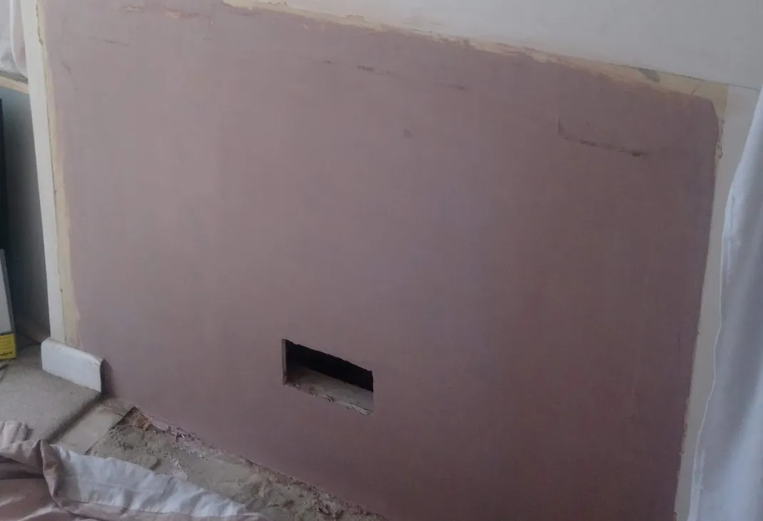 Fireplace removal wall plastering