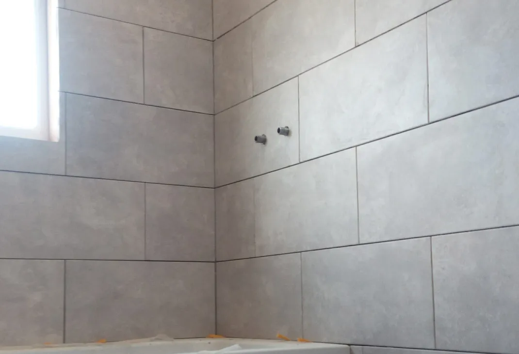 New bathroom tiled wall