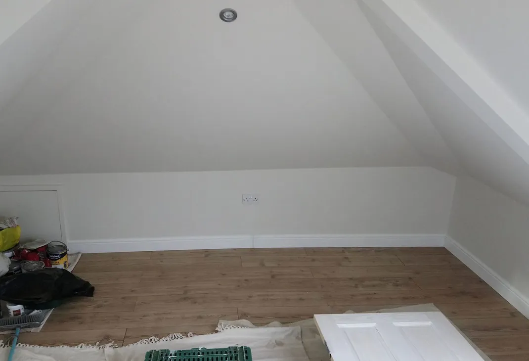 Newly decorated loft conversion bedroom with new floor