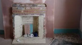 Plaster project for dining room fireplace