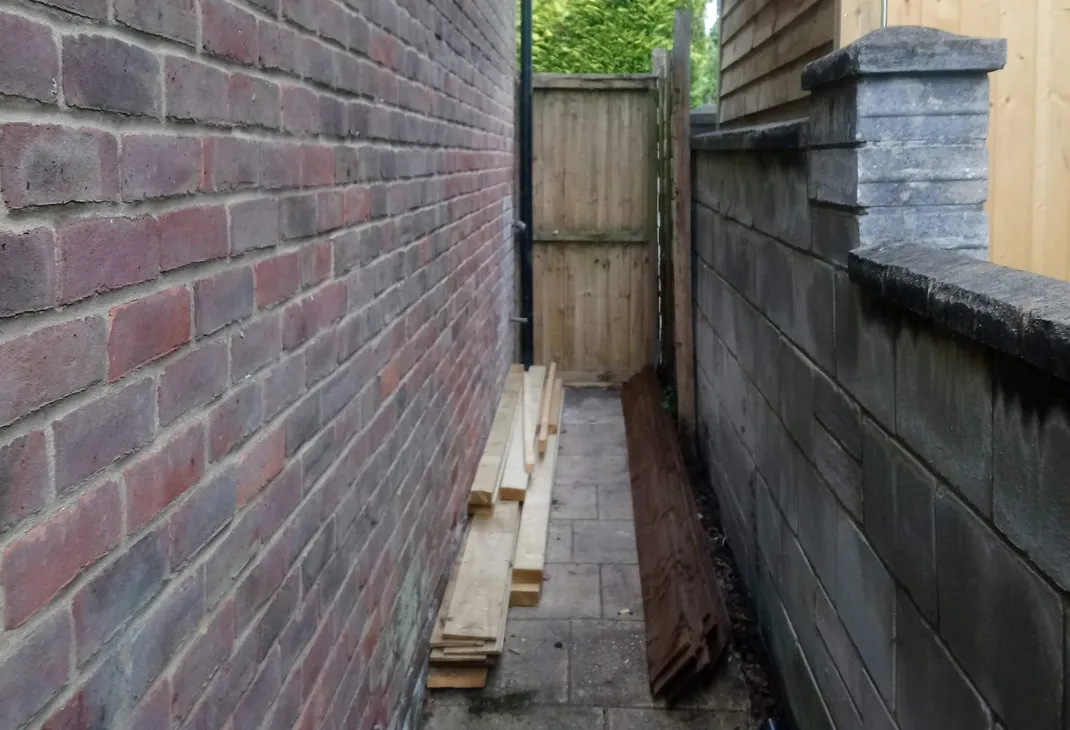 Side of house prior to new lean to